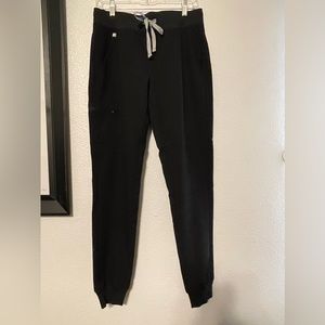 Black Figs jogger scrub pants.